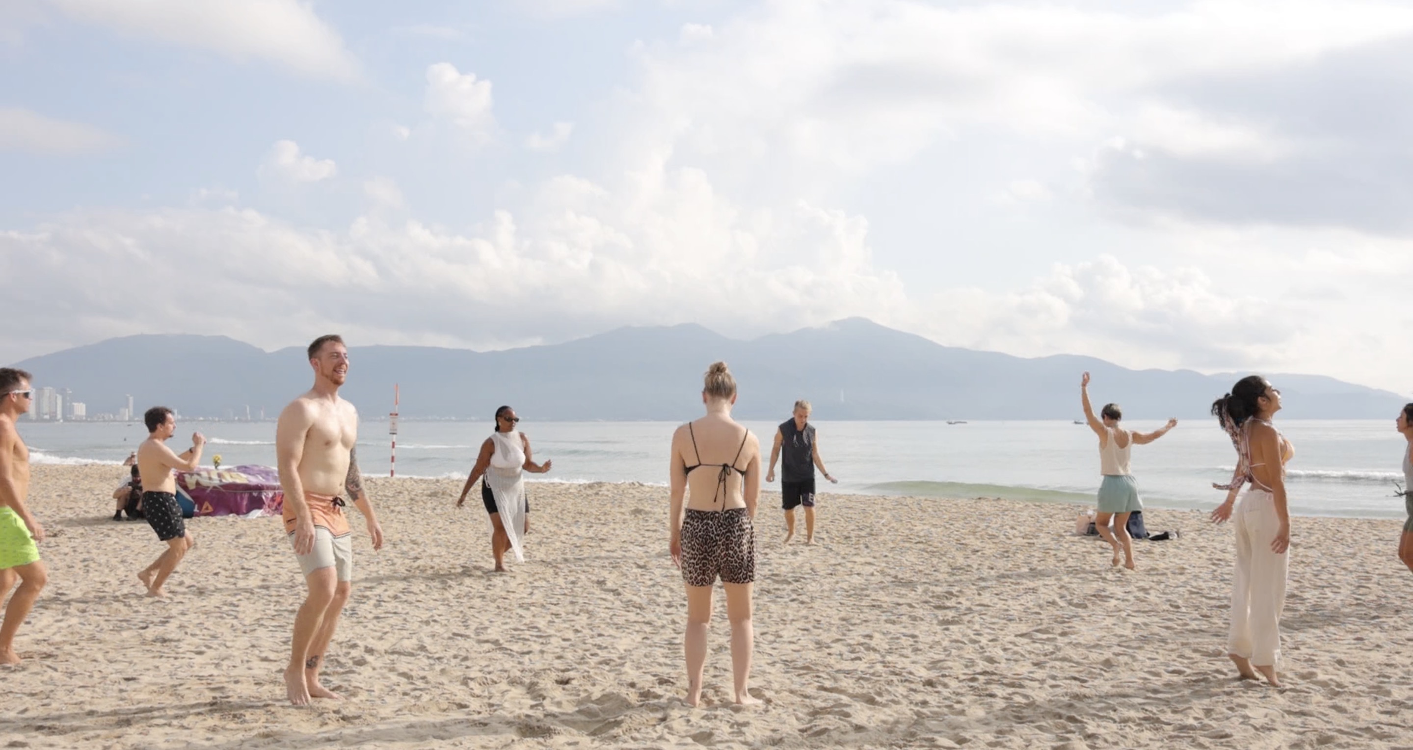 Group dancing on the beach